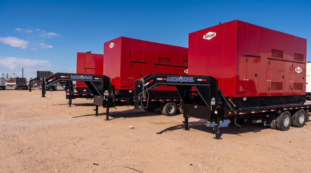 Red Taylor TGA400 industrial generators on gooseneck trailers, sold and ready for delivery